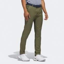 Adidas Golf Trousers - Primegreen Tapered Pant - Olive Strata AW23 -Golf Fashion Shop 0004 hr9048 5 apparel on model walking view grey