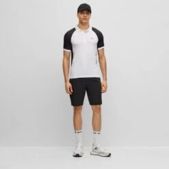 BOSS Golf Shirt - Pauletech Slim - Training White SP23 -Golf Fashion Shop boss golf shirt pauletech slim training white sp23 hbeu50487842 100 300