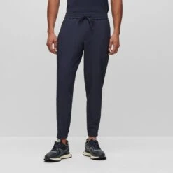BOSS Golf Trousers - T_Flex Slim - Dark Navy FA23 -Golf Fashion Shop boss golf trousers t flex slim dark navy fa23 50495491 402 lifestyle