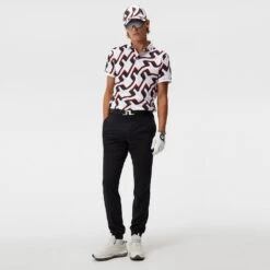 J.Lindeberg Golf Trousers - Cuff Jogger Pant - Black AW23 -Golf Fashion Shop j lindeberg golf joggers performance cuffed pant black ss23 gmpa08622 9999 34