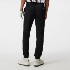 J.Lindeberg Golf Trousers - Cuff Jogger Pant - Black AW23 -Golf Fashion Shop j lindeberg golf joggers performance cuffed pant black ss23 gmpa08622 9999 35