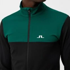 J.Lindeberg Golf Mid Layer - Banks FZ - Rain Forest AW23 -Golf Fashion Shop j lindeberg golf mid layer banks fz rain forest aw23 amjs09082 m374 78