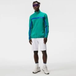 J.Lindeberg Golf Mid Layer - Jarvis FZ - Proud Peacock AW23 -Golf Fashion Shop j lindeberg golf mid layer jarvis fz proud peacock aw23 amjs09084 m501 30