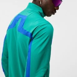 J.Lindeberg Golf Mid Layer - Jarvis FZ - Proud Peacock AW23 -Golf Fashion Shop j lindeberg golf mid layer jarvis fz proud peacock aw23 amjs09084 m501 32