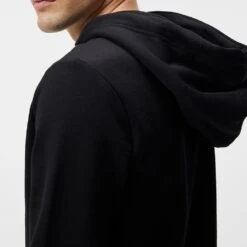 J.Lindeberg Golf Hoodie - Alpha Fleece FZ - Black SS23 -Golf Fashion Shop j lindeberg golf pullover alpha zip hood black ss23 amjs07674 9999 o