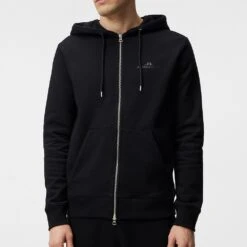 J.Lindeberg Golf Hoodie - Alpha Fleece FZ - Black SS23 -Golf Fashion Shop j lindeberg golf pullover alpha zip hood black ss23 amjs07674 9999 r