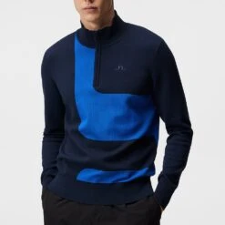 J.Lindeberg Golf Pullover - Davis Knitted QZ - JL Navy SS23 -Golf Fashion Shop j lindeberg golf pullover davis knitted sweater jl navy ss23 amkw08138 6855 b