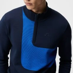 J.Lindeberg Golf Pullover - Davis Knitted QZ - JL Navy SS23 -Golf Fashion Shop j lindeberg golf pullover davis knitted sweater jl navy ss23 amkw08138 6855 e
