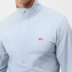 J.Lindeberg Golf Pullover - Luke HZ Mid - Skyway AW23 -Golf Fashion Shop j lindeberg golf pullover luke hz mid skyway aw23 amjs09079 o010 62