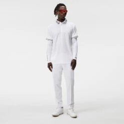 J.Lindeberg Golf Shirt - Austin Regular Fit - White AW23 -Golf Fashion Shop j lindeberg golf shirt austin regular fit white aw23 gmjt08847 0000 28