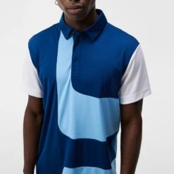 J.Lindeberg Golf Shirt - Graham Regular Fit - Estate Blue AW23 -Golf Fashion Shop j lindeberg golf shirt graham regular fit estate blue aw23 gmjt08854 o341 42