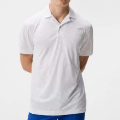 J.Lindeberg Golf Shirt - Resort Relaxed Fit - White HS23 -Golf Fashion Shop j lindeberg golf shirt resort relaxed fit white hs23 gmjt08406 0000 e