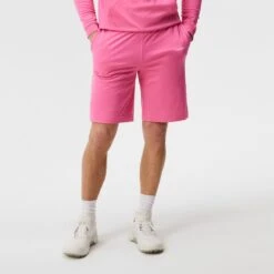J.Lindeberg Golf Shorts - Jersey Logo - Azalea Pink HS23 -Golf Fashion Shop j lindeberg golf shorts jersey logo azalea pink hs23 gmjs08398 s098 e