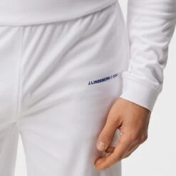 J.Lindeberg Golf Shorts - Jersey Logo - White HS23 -Golf Fashion Shop j lindeberg golf shorts jersey logo white hs23 gmjs08398 0000 b