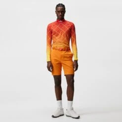 J.Lindeberg Golf Shorts - Vent Tight Fit - Russet Orange SS23 -Golf Fashion Shop j lindeberg golf shorts vent tight shorts russet orange ss23 gmpa07908 i068 a