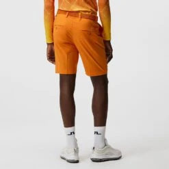 J.Lindeberg Golf Shorts - Vent Tight Fit - Russet Orange SS23 -Golf Fashion Shop j lindeberg golf shorts vent tight shorts russet orange ss23 gmpa07908 i068 d