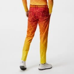 J.Lindeberg Golf Trousers - Fade Print Pant Slim - Sunset SS23 -Golf Fashion Shop j lindeberg golf trousers fade print pant sunset fade logo ss23 gmpa08235 i174 c