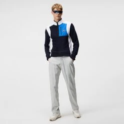 J.Lindeberg Waterproof Golf Trousers - Hills Pant - High Rise SS23 -Golf Fashion Shop j lindeberg golf trousers hills rain pant high rise ss23 ampa07520 u232 d