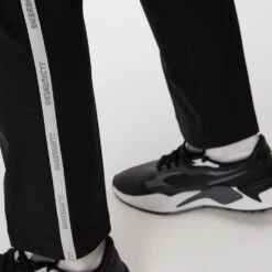 J.Lindeberg Golf Trousers - Stuart Stripe Pant Slim - Black AW23 -Golf Fashion Shop j lindeberg golf trousers stuart stripe pant slim black ss23 gmpa07912 9999 84