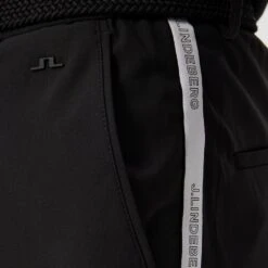 J.Lindeberg Golf Trousers - Stuart Stripe Pant Slim - Black AW23 -Golf Fashion Shop j lindeberg golf trousers stuart stripe pant slim black ss23 gmpa07912 9999 85
