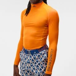 J.Lindeberg Golf Base Layer - Aello SC - Exuberance AW23 -Golf Fashion Shop j lindeberg golf base layer aello sc exuberance aw23 gmjt08563 i075 17