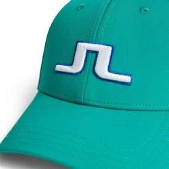 J.Lindeberg Golf Cap - Angus - Proud Peacock AW23 -Golf Fashion Shop j lindeberg golf cap angus proud peacock aw23 3 detail