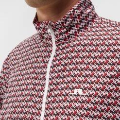 J.Lindeberg Golf Jacket - Ash Light Packable Print - MB Cherry AW23 -Golf Fashion Shop j lindeberg golf jacket ash light packable print mb cherry aw23 5 lifestyle