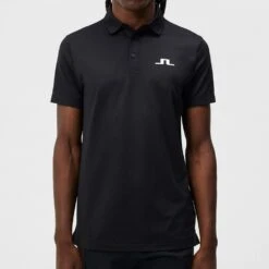 J.Lindeberg Golf Shirt - Bridge Regular Fit - Black AW23 -Golf Fashion Shop j lindeberg golf shirt bridge regular fit black aw23 gmjt08838 9999 93