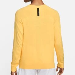 Nike Golf Jumper - TW Knit Crew Neck - Topaz Gold SU23 11 Nike Golf Jumper - TW Knit Crew Neck - Topaz Gold SU23 -Golf Fashion Shop nike golf jumper tw knit crew neck topaz gold su23 dr5291 795 73